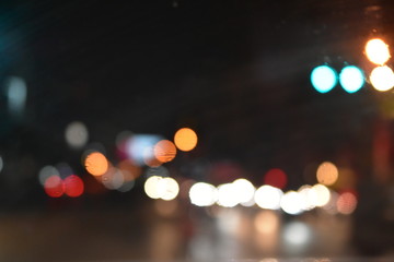 golden and colorful light bokeh at night on the road  background 