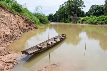 Old wooden boat for fishing in the river