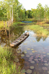 Old wooden boat for fishing in the river