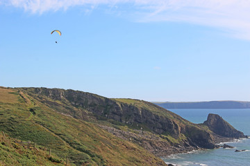 Paraglider above Newgale Beach, St Brides Bay, Wales	