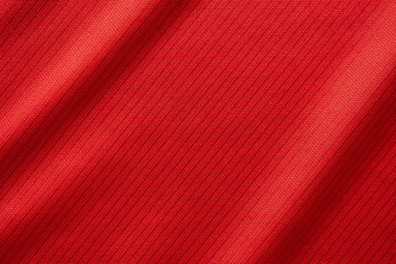 Red sports clothing fabric football jersey texture close up