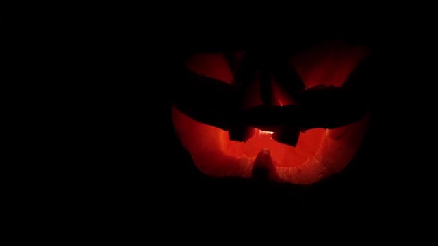 Halloween pumpking glowing in the dark
