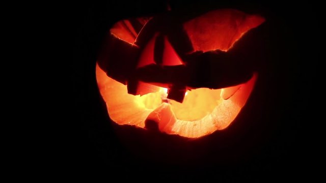 Halloween pumpking glowing in the dark