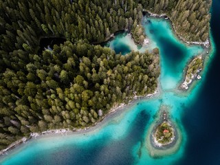 Aerial view of the Eibsee lake with islands and green trees on the lake shore.Germany,Bavaria
