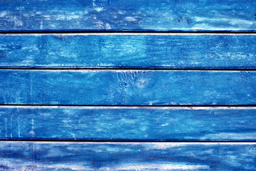 Blue stained wood background texture. Deep blue wooden background with horizontal boards