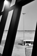 Shuttle airport bus in the airport terminal , black and white