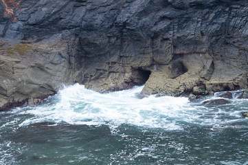 waves crashing on the rocks