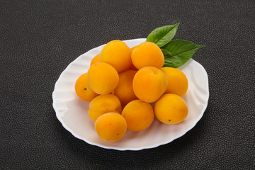 Ripe tasty sweet apricots heap