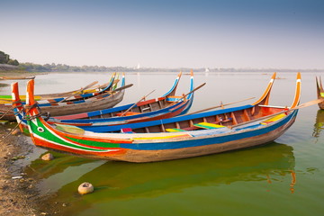 Fototapeta na wymiar Myanmar. Landscape. Boats in lake. Trash