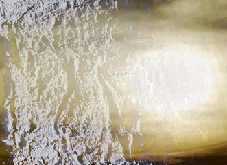 The mixed image of the textured surface of white and grey colors and the natural background of the view of the lake at the cold spring sunset at the City Park. 