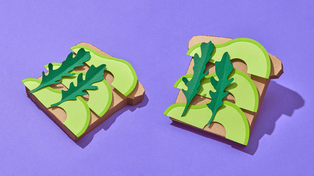 Handcraft paper origami colored vegan sandwich with avocado vege