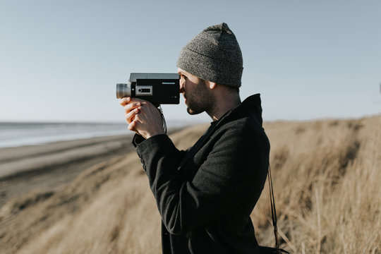 Man Holding 16mm Camera