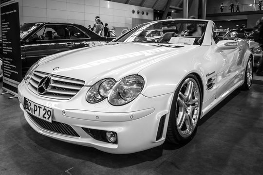 STUTTGART, GERMANY - MARCH 03, 2017: Grand Tourer car Mercedes-Benz SL55 AMG (R230), 2005. Black and white. Europe's greatest classic car exhibition "RETRO CLASSICS"