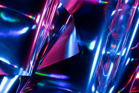 Reflection of light on holographic foils with neon lighting