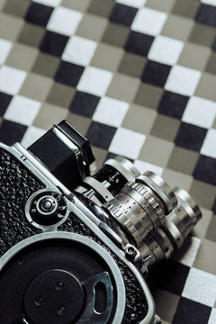 8mm camera on geometric background