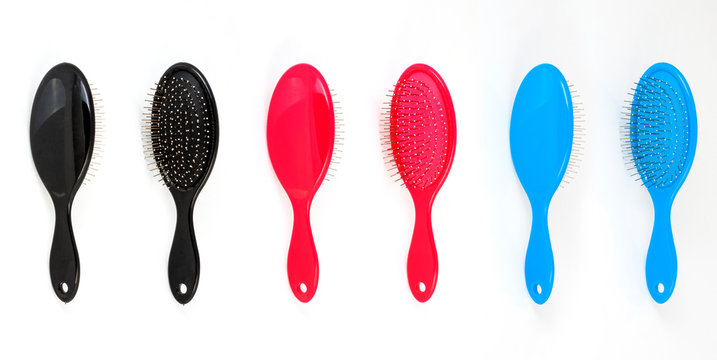 Beautiful trendy Big set of plastic hair brushes different color isolated on white background front and back view