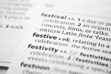 Fototapeta premium Word or phrase Festive in a dictionary.