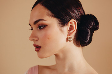 Profile beauty portrait of amazing woman with elegant make up