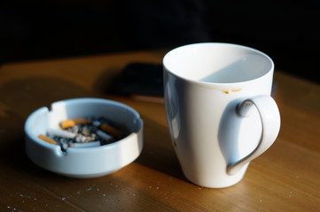 A cup of hot coffee with traditional serving and processing can be enjoyed in the morning