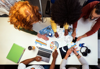 Unrecognizable business group at a workshop in the office
