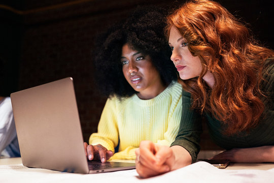 Businesswoman Using laptop In Office