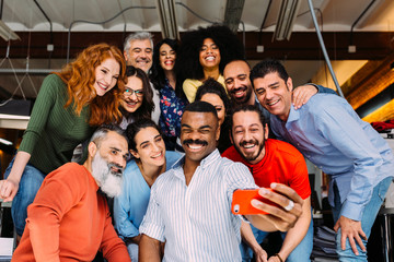 Business people taking selfie