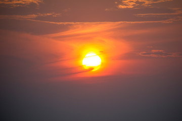Sun in beautiful violet clouds