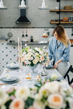 Pretty woman with bunch of flowers