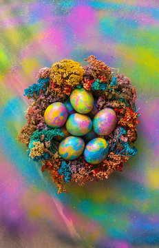 Beautiful psychedelic Easter eggs in a nest