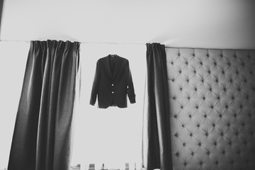 Stylish groom suit in dressing room indoors