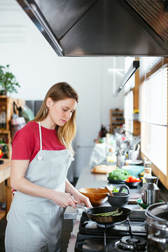 Woman preparing the meal.