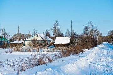 Winter landscape with a view of a typical small russian village Parskoe/ Rodnikovsky district/ Ivanovo region/ Russia