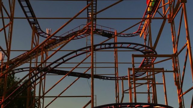 Extreme roller coaster ride in an amusement park
