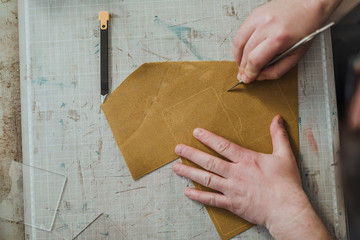 Man Working At Manufacture Of Craft Leather Products