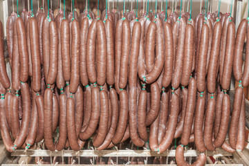 sausages are drying after cooking in hot water in the slaughter house