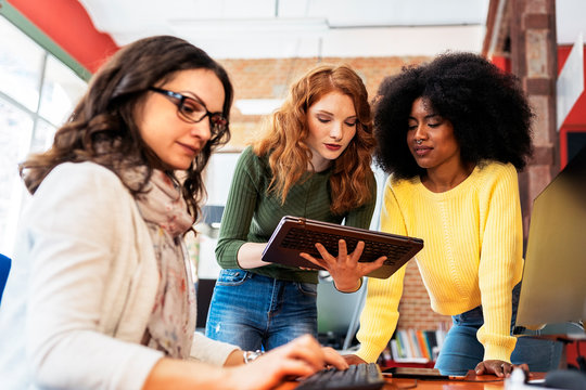 Businesswoman Using device In Office
