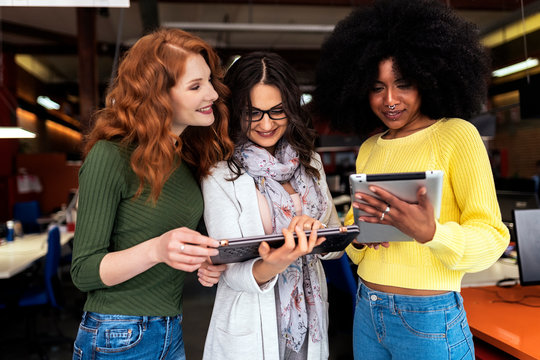 Businesswoman Using device In Office