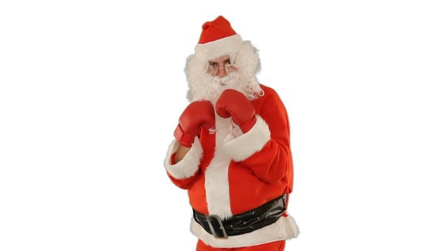 Santa Claus wearing boxing gloves, close up, against white