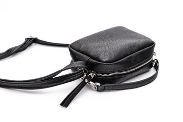 Luxury fashion women leather black handbag isolated on a white background.