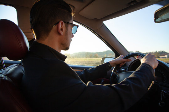 Man driving a car