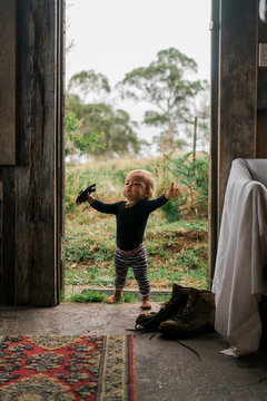 A baby entering a room with a bang
