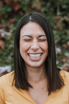 Adorable Photo of Woman Genuinely Laughing
