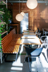 cozy beautiful and fashionable interior of the cafe decorated.
