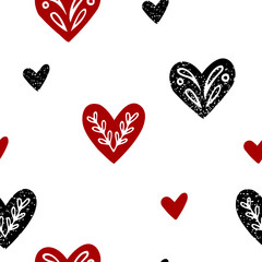 Seamless pattern of hearts with ethnic branch.