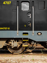 Black and yellow train locomotive detail