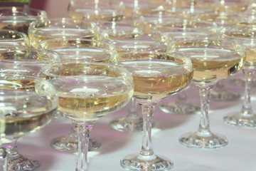 glasses with champagne on the festive table