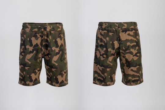 Sport shorts ,camo color, front and back view isolated on white.