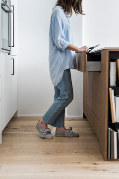 Woman Standing at Kitchen