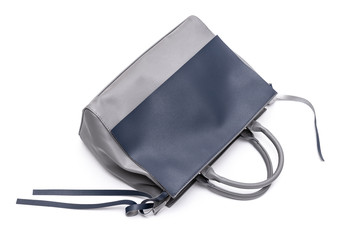 Luxury fashion women leather blue handbag isolated on a white background.