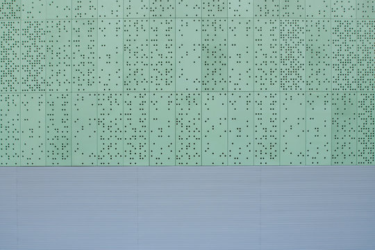 Abstract facade with green panels